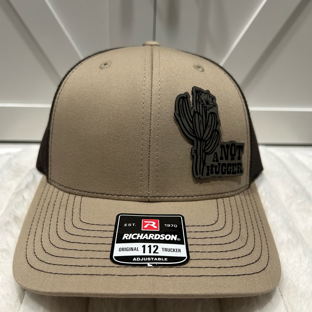 Not a hugger Laser engraved Richardson trucker hat.